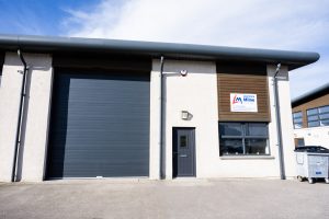 Lawrence Milne exterior of office and storage 