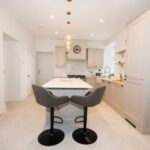 Two bar stools in newly renovated kitchen, Banff